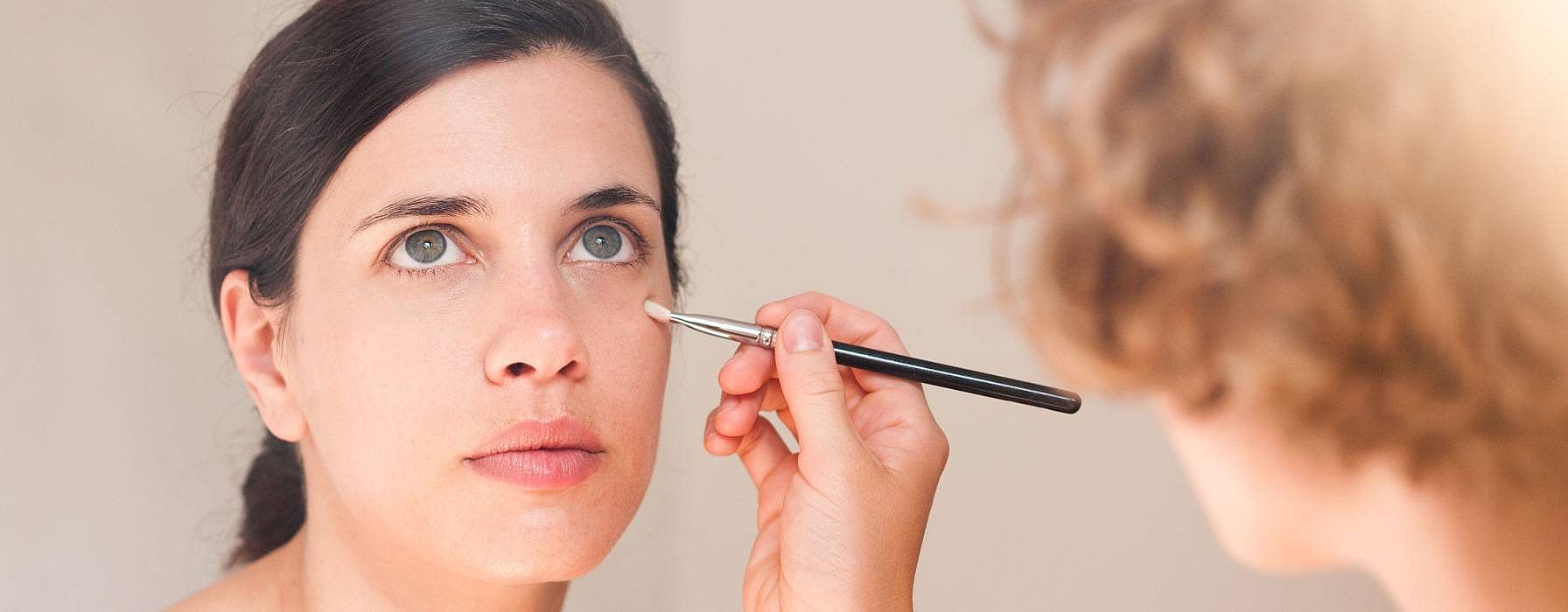 Women doing makeup