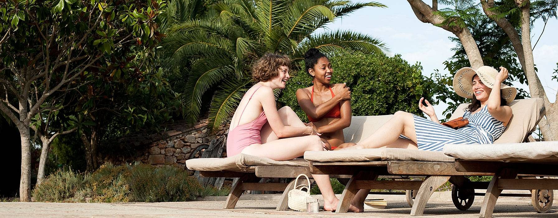tree girls by the pool