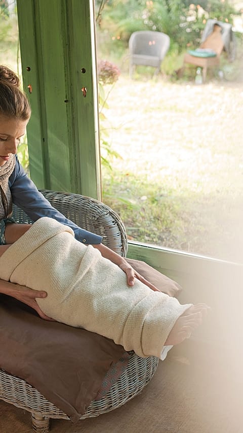 wraping feet in warm towel