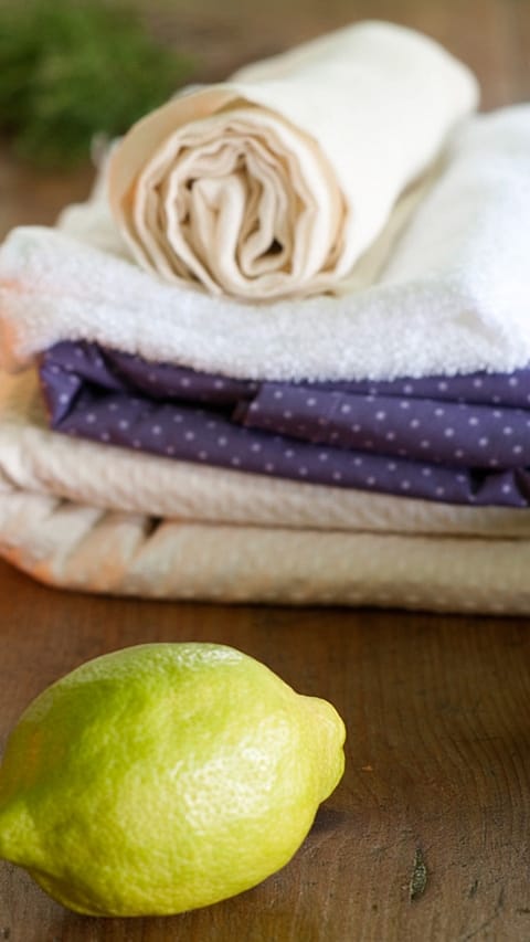 Lemon and towels on the table