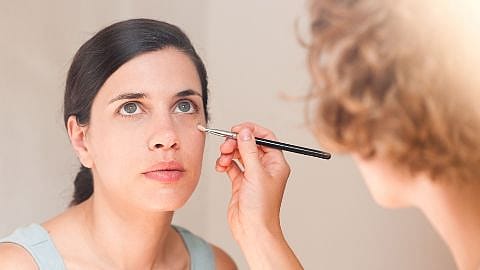 Women doing makeup