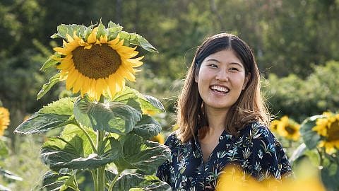 women with a sunflower
