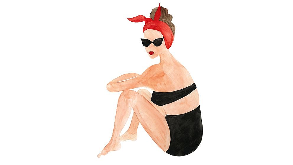 women sitting in bikini