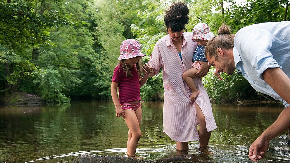 Family by the water